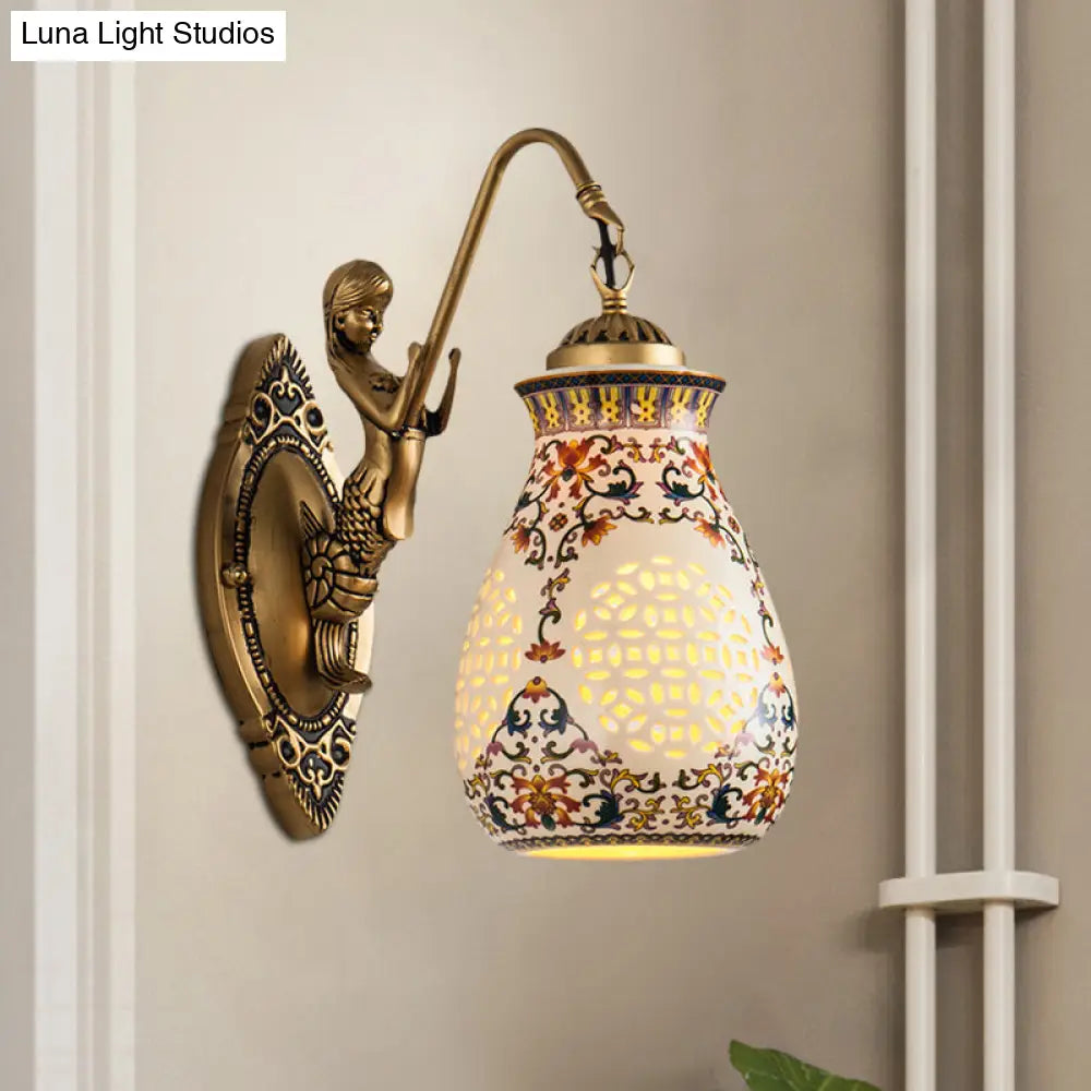 Antique Brass Ceramic Wall Sconce With Pierced Jar Traditional Patterned Design And Small Mermaid
