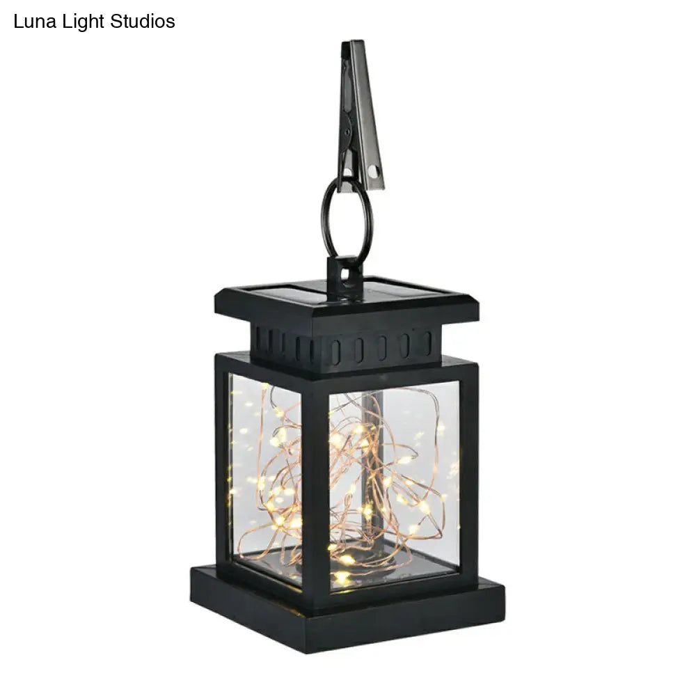 Artistic Black Led Solar Lantern Pendant Light With Clear Glass Clamp And Hook