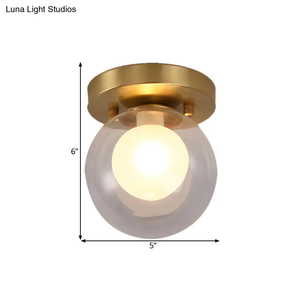 Brass Dual Orb Ceiling Flush Mount Fixture With Clear And Opal Glass