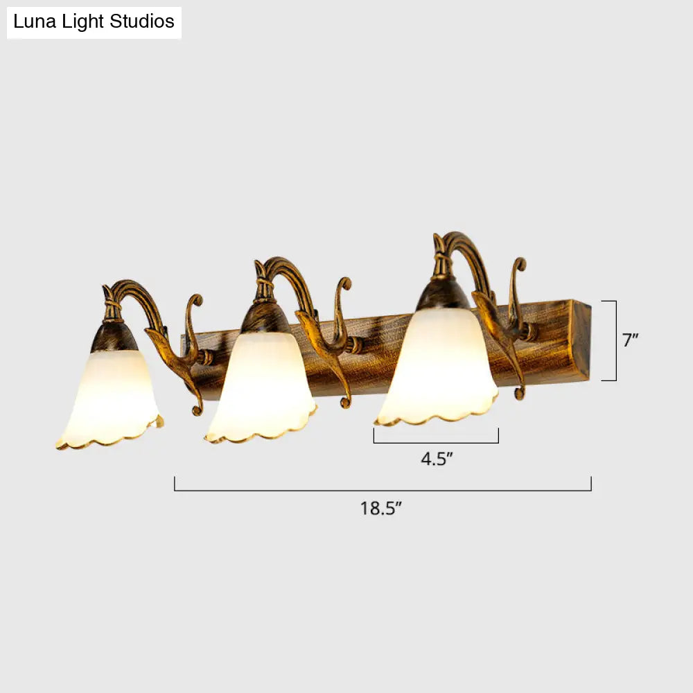 Bronze Wall Lamp With Country Flower Shade And White Rid Glass For Vanity Lighting