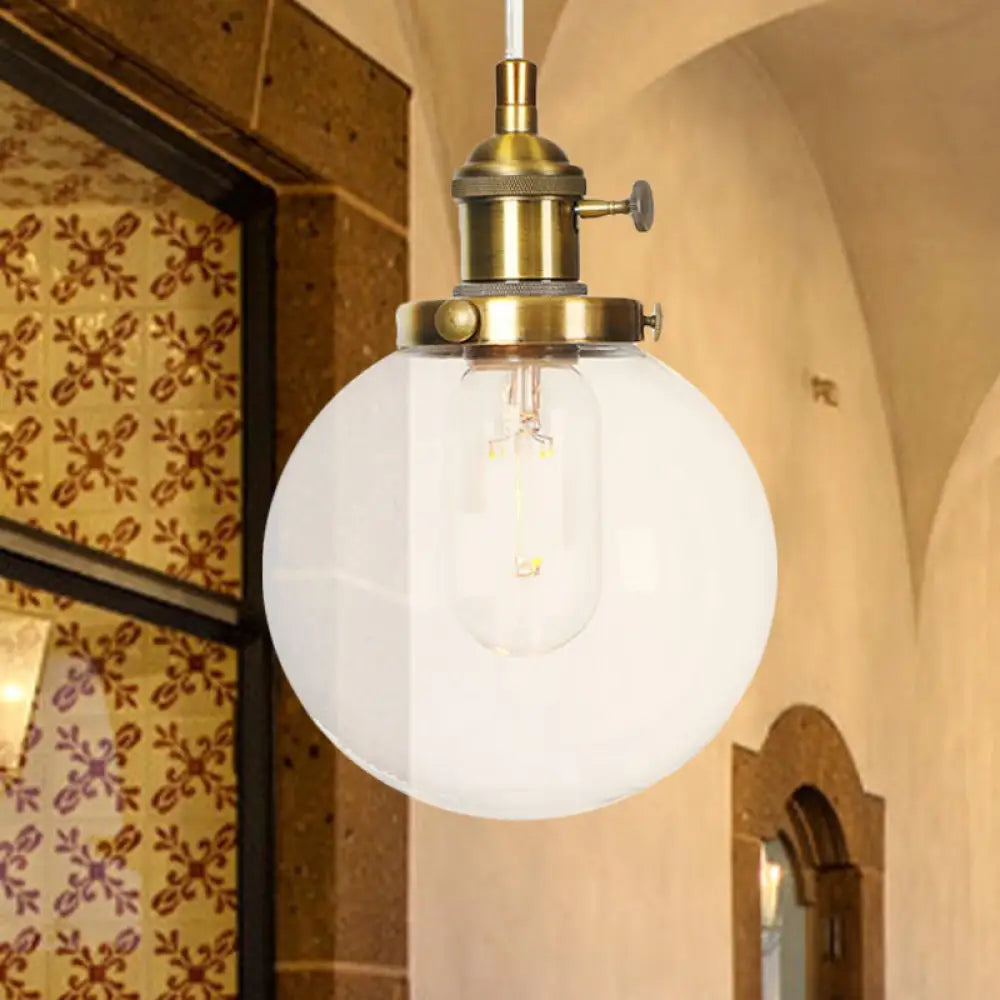 Farmhouse Orbit Pendant Light With Amber/Clear Glass And Adjustable Cord In 3 Elegant Finish