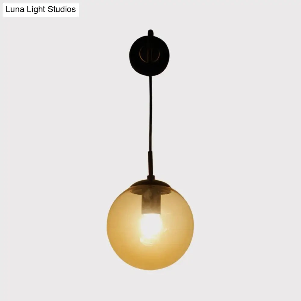Industrial Amber Glass Wall Lamp - 1 Light Globe Sconce Fixture In Black/Brass For Living Room