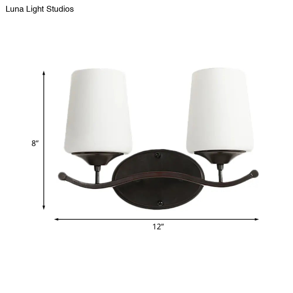 Ivory Glass Vanity Lighting With Iron Wavy Arm - Traditional Black Tapered Wall Light For Bedroom