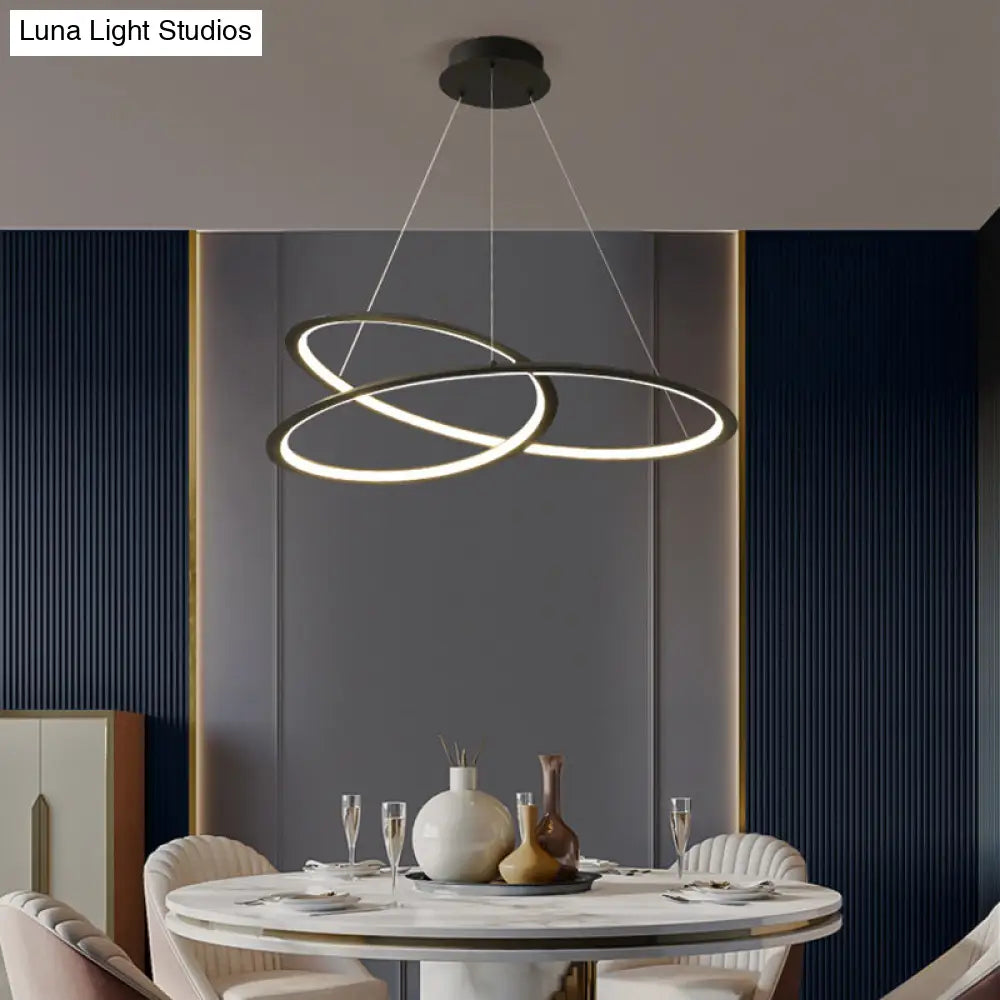 Metal Led Chandelier: Sleek Seamless Curves For Minimalistic Dining Room Lighting
