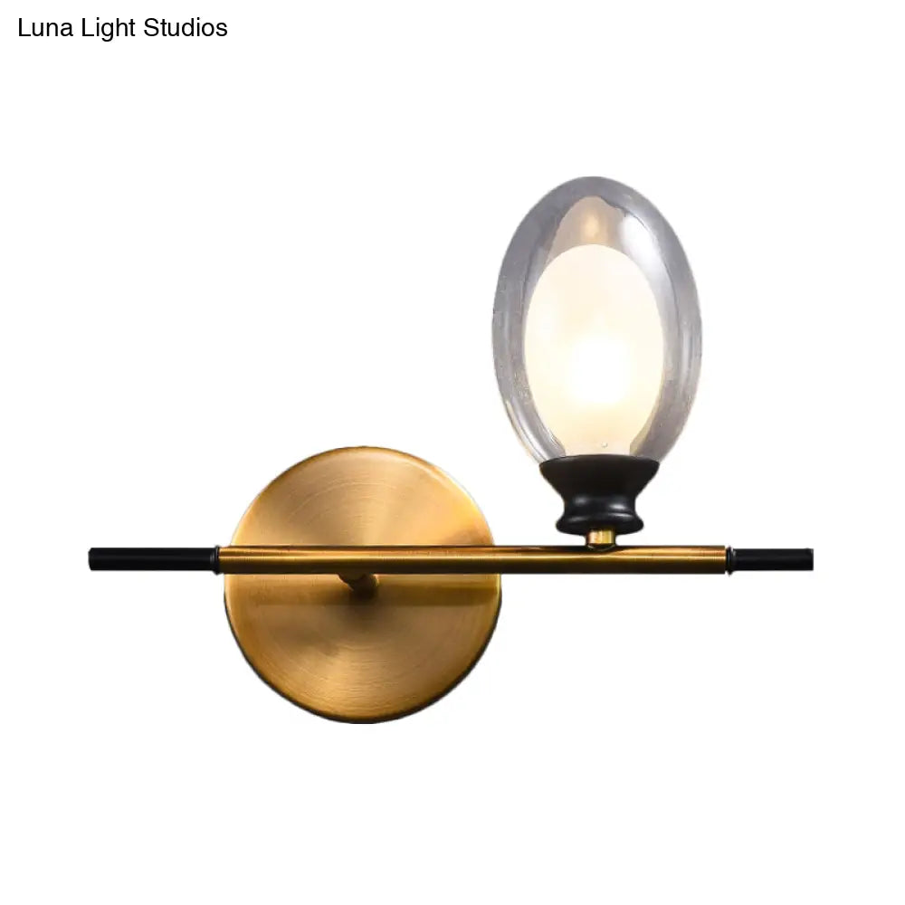 Mid Century Brass Wall Lamp With Dual Oval Clear/Amber Glass Shade
