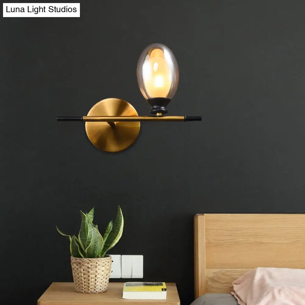 Mid Century Brass Wall Lamp With Dual Oval Clear/Amber Glass Shade