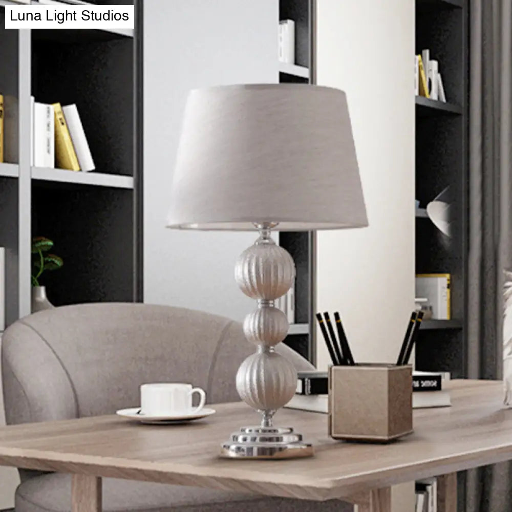 Minimal Silver Bedside Lamp With Ceramic Base And Fabric Shade