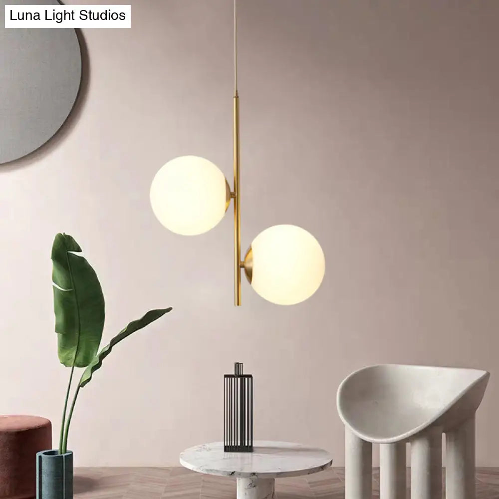 Minimalist Gold Suspension Chandelier: Opaque Glass Spherical 2-Head Light For Dining Room