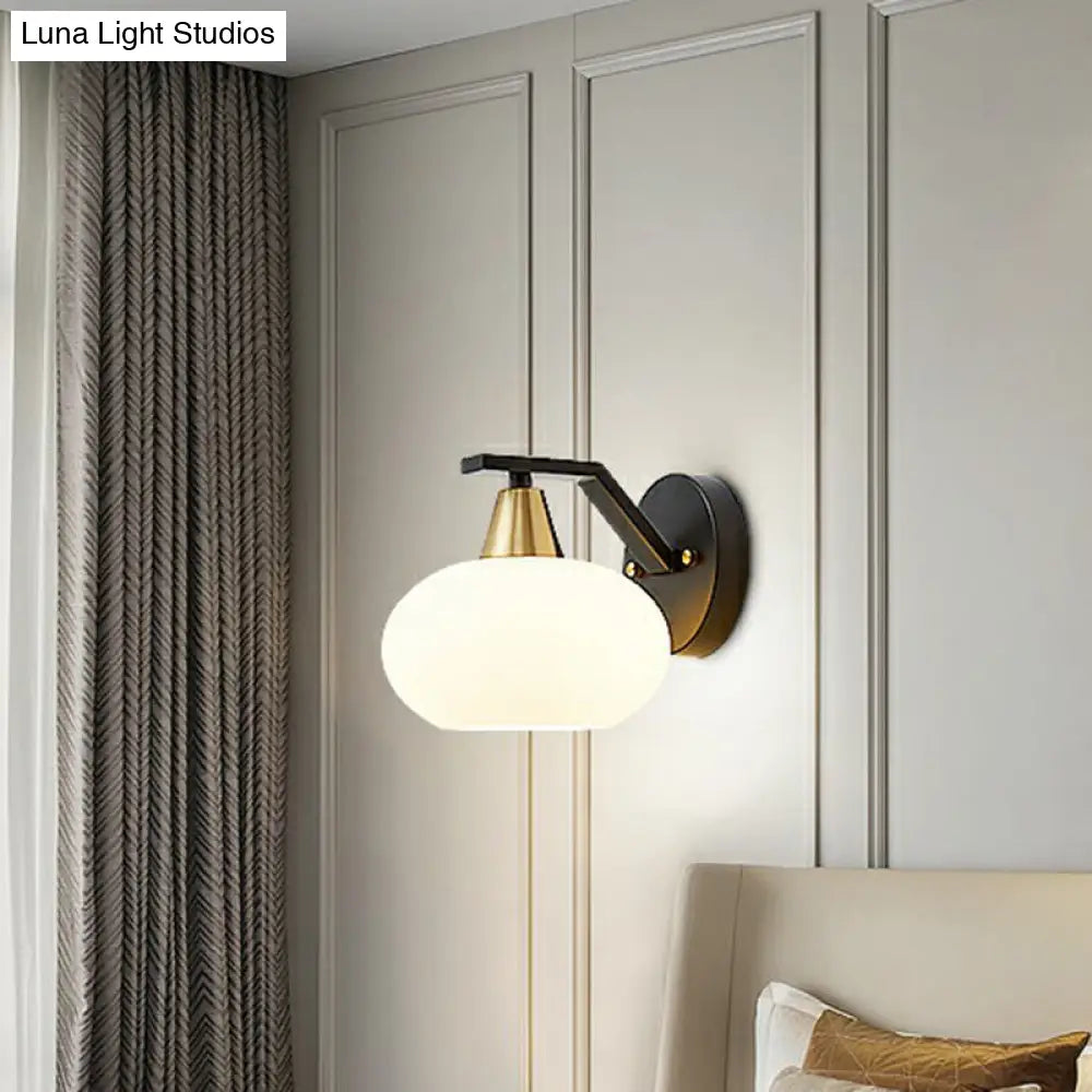 Minimalist White Glass Ellipse Wall Light Fixture - Single Black Sconce For Bedroom