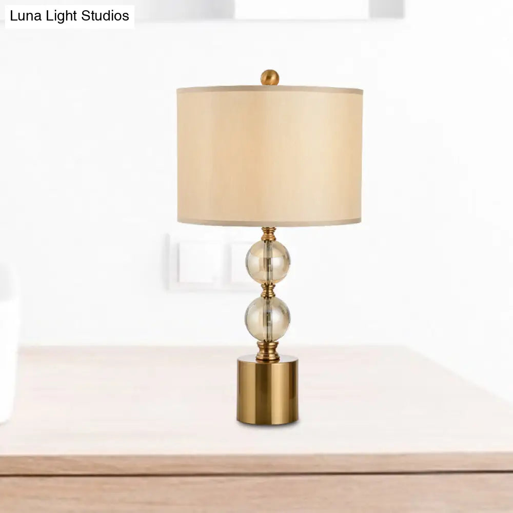 Modern Gold Cylindrical Table Lamp With Metal Base