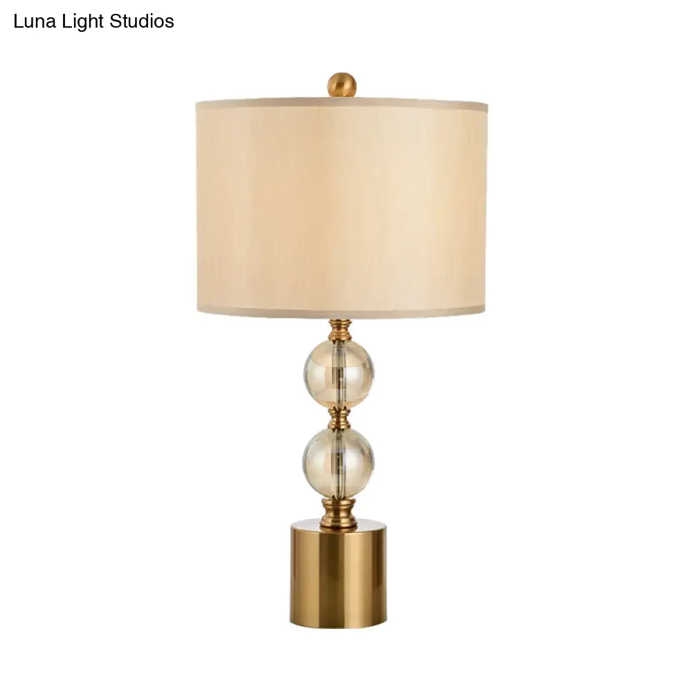 Modern Gold Cylindrical Table Lamp With Metal Base