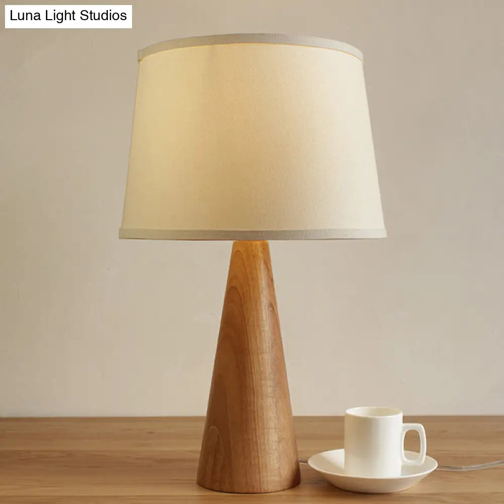 Modern White Nightstand Lamp With Shaded Fabric Table Light And Conical Brown Wood Base