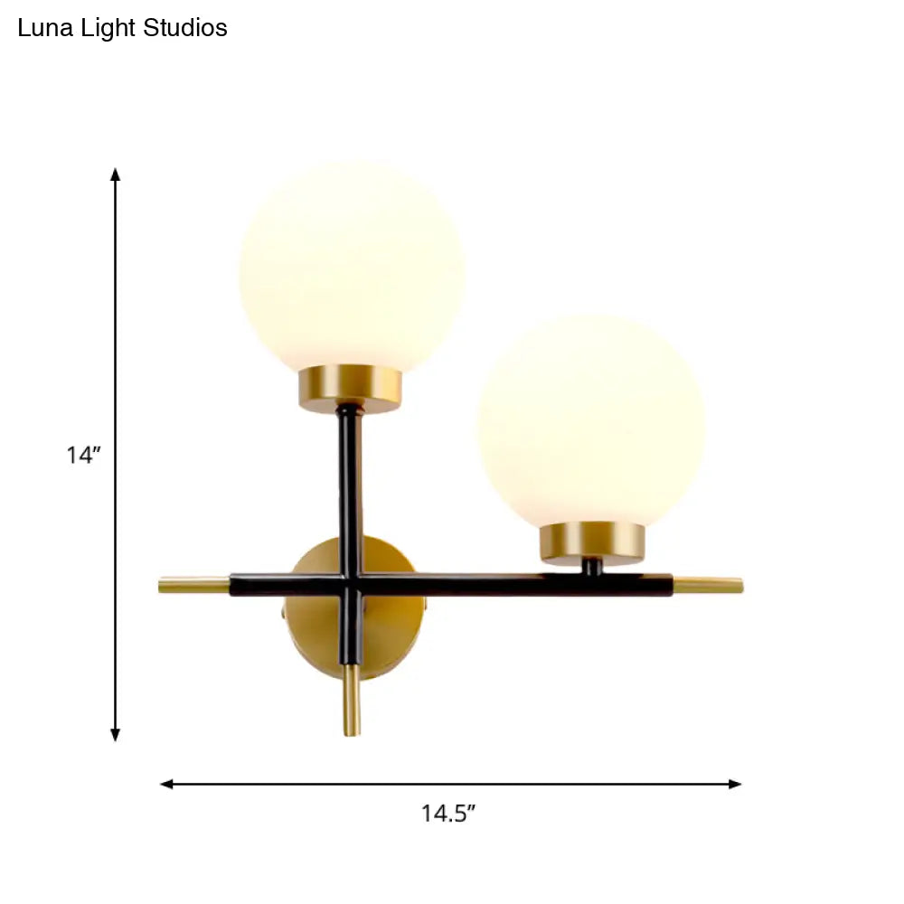 Post-Modern White Glass Sphere Wall Sconce With Brass Finish - 1/2 Bulbs