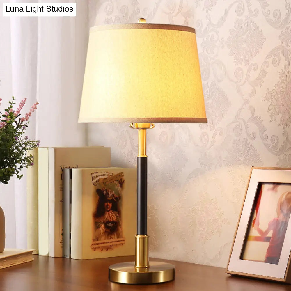 Vintage Brass Bedside Table Lamp With Single Bulb Tapered Design And Fabric Shade