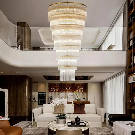 Long cascading glass staircase chandelier in a double height stairwell