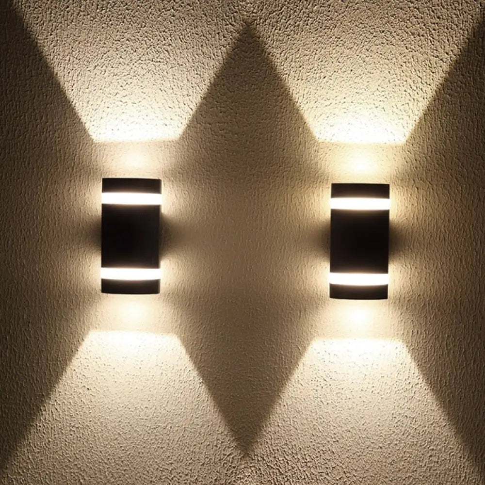 Modern IP65 waterproof outdoor LED wall light on a garden wall