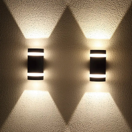 Modern IP65 waterproof outdoor LED wall light on a garden wall
