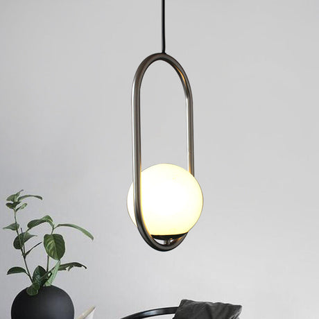 Sleek Chrome Oblong Pendant Light With Minimalist Design And Orb White Glass Shade