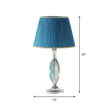 Traditional Clear Crystal Night Light With Blue Fabric Shade And Oblong Base

This Revised Title