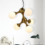 Modern Metal Starburst Chandelier With Glass Globe Shades - 5/9/15 Lights In Brass