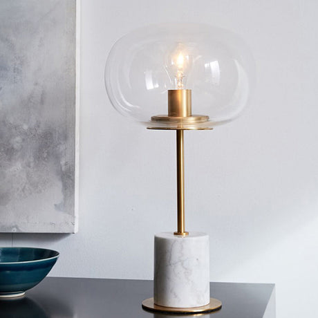 Clear Glass Night Light With Minimalist Oval Design Brass Accents And Marble Base White
