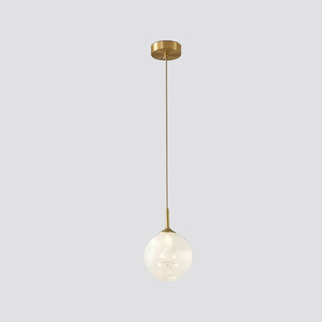 Sleek Brass Sphere Led Pendant Lamp For Modern Dining Rooms
