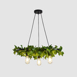 Antique Iron Wagon Wheel Chandelier With Green Plant Decor - Perfect For Restaurant Ceilings