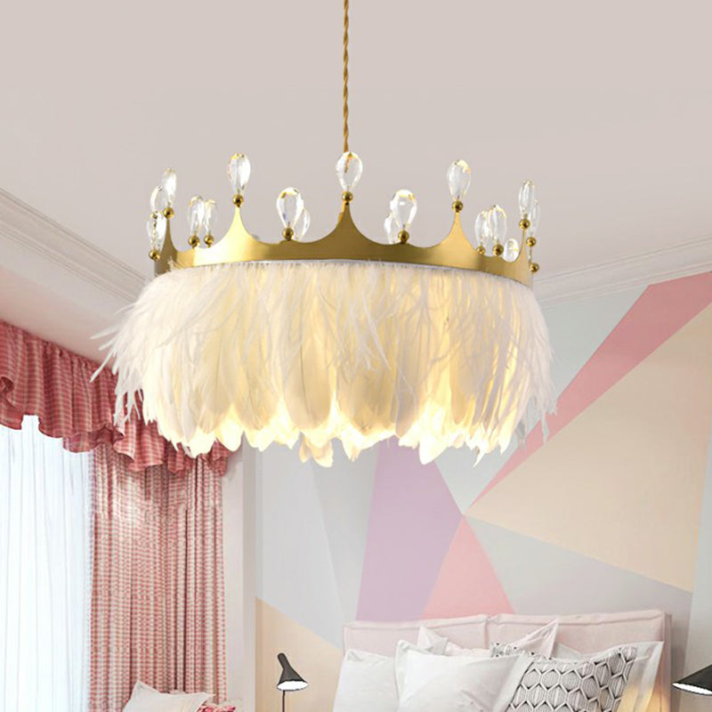 Modern Single Gold Crown Pendant Light With Crystal And Feather Accents - Metallic Suspension