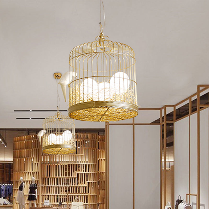 Rustic Matte White Glass Egg Shaped Chandelier With Bird And Birdcage - 3 Light Hanging Fixture