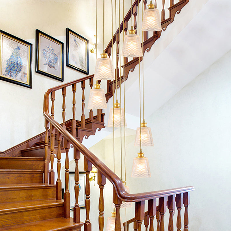 Gold 10-Light Staircase Hanging Pendant With Lattice Glass Bell Shades - Simplicity Collection