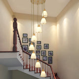Simplicity Cream Glass Staircase Hanging Light With Spiral Bell Shade - Multi Pendant