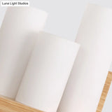 3-Head Contemporary Tube Shade Wall Lamp With Wooden Shelf Perfect For Cloth Shop