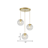 Minimalist Pumpkin Ball Pendant Light - Clear Glass 3 Lights Gold Finish Metal Line Deco
