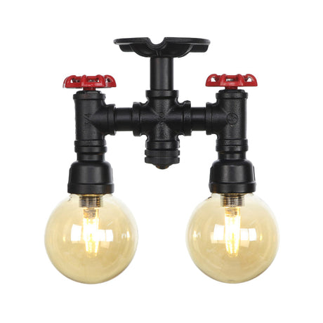 2-Head Semi-Flush Industrial Ball Amber Glass Ceiling Fixture In Black