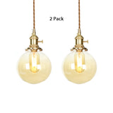 Amber Pendant Light With Adjustable Cord And Globe Glass Shade - Industrial Indoor Lighting / 2