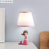 Aludra - Pink Cartoon Single Desk Light With Barrel Shade Fabric Finish Girl Night Table Lamp