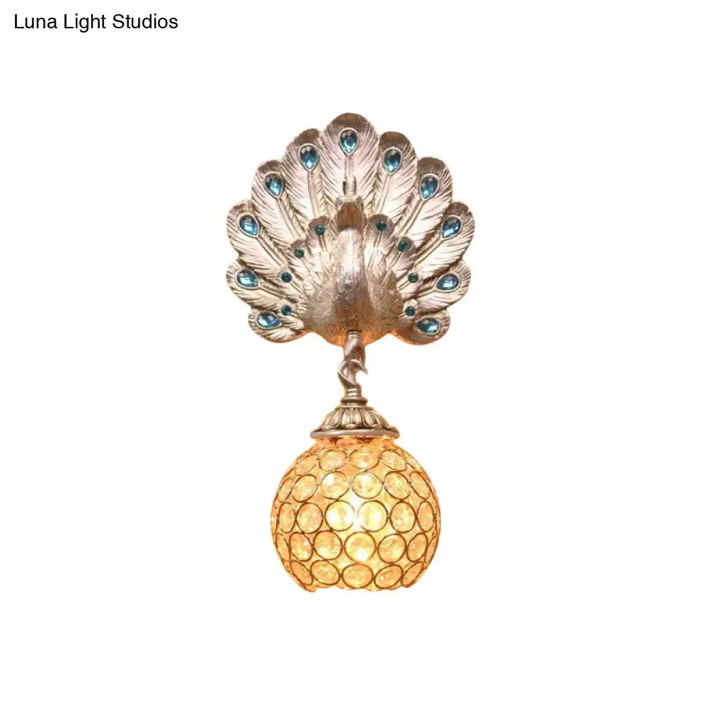 Antique Style Metal And Crystal Dome Wall Light With Silver Peacock Backplate