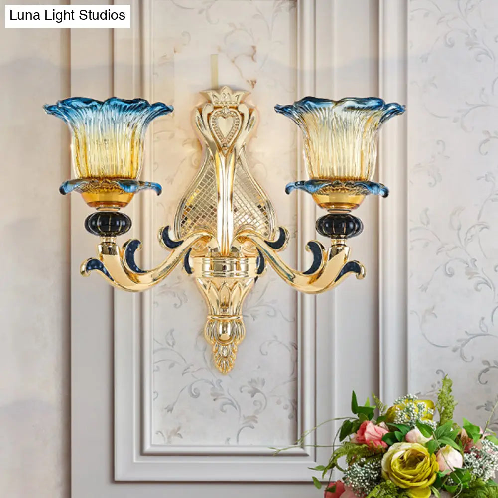 Antiqued Gold Flower Wall Sconce With Clear Ruffle Glass Bulbs - Curved Arm Mounted Lamp