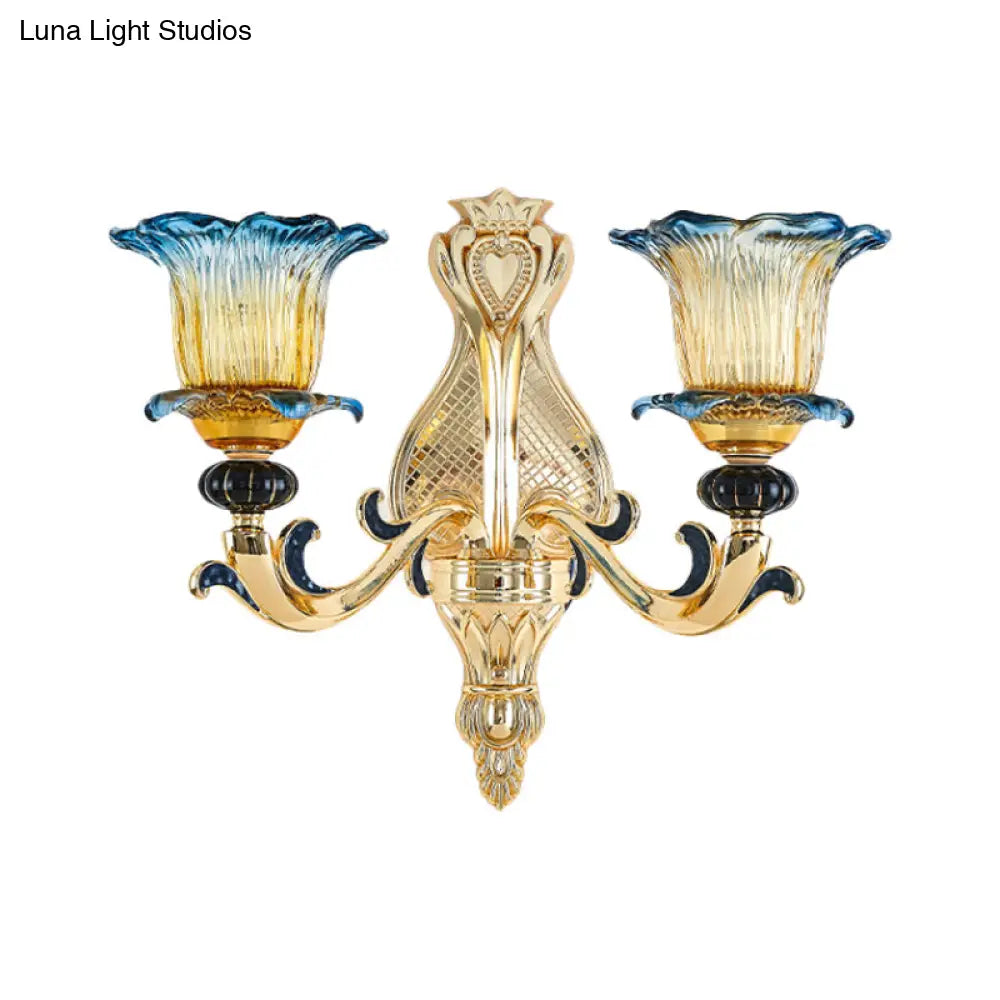 Antiqued Gold Flower Wall Sconce With Clear Ruffle Glass Bulbs - Curved Arm Mounted Lamp