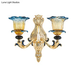 Antiqued Gold Flower Wall Sconce With Clear Ruffle Glass Bulbs - Curved Arm Mounted Lamp