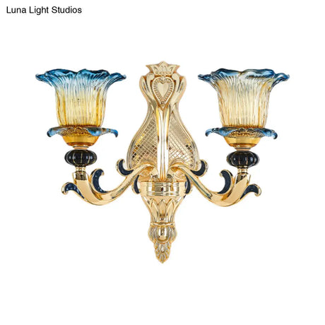 Antiqued Gold Flower Wall Sconce With Clear Ruffle Glass Bulbs - Curved Arm Mounted Lamp