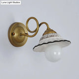 Antiqued Scalloped Wall Lighting: 1-Head Ceramic Sconce With Brass Twisted Arm