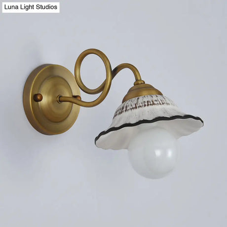 Antiqued Scalloped Wall Lighting: 1-Head Ceramic Sconce With Brass Twisted Arm