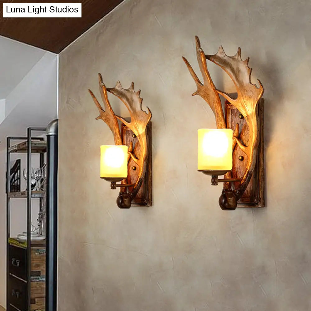 Antler Decor Wall Mount Light With Beige Glass Fixture In Brown - Traditional Cup Style