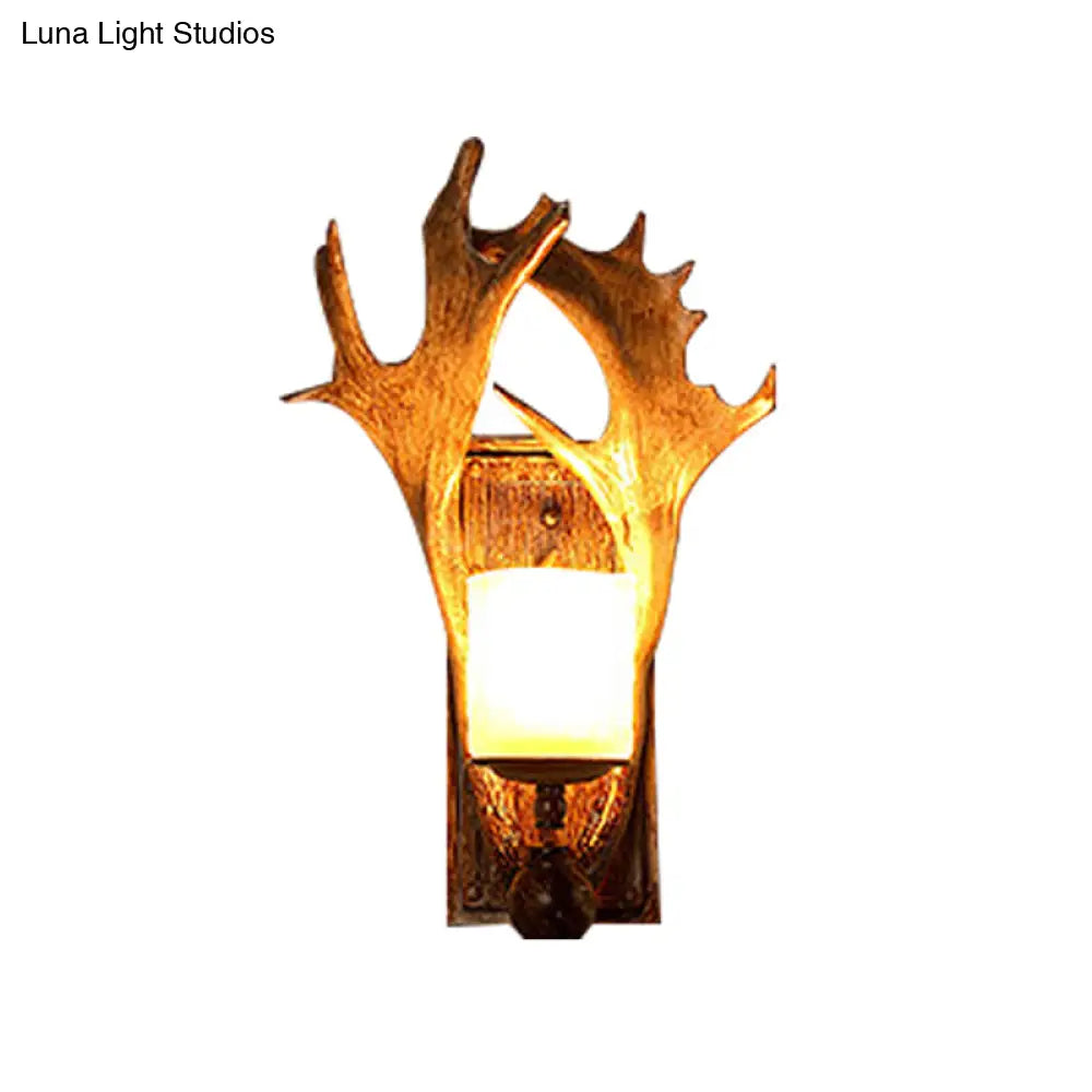 Antler Decor Wall Mount Light With Beige Glass Fixture In Brown - Traditional Cup Style