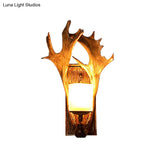 Antler Decor Wall Mount Light With Beige Glass Fixture In Brown - Traditional Cup Style