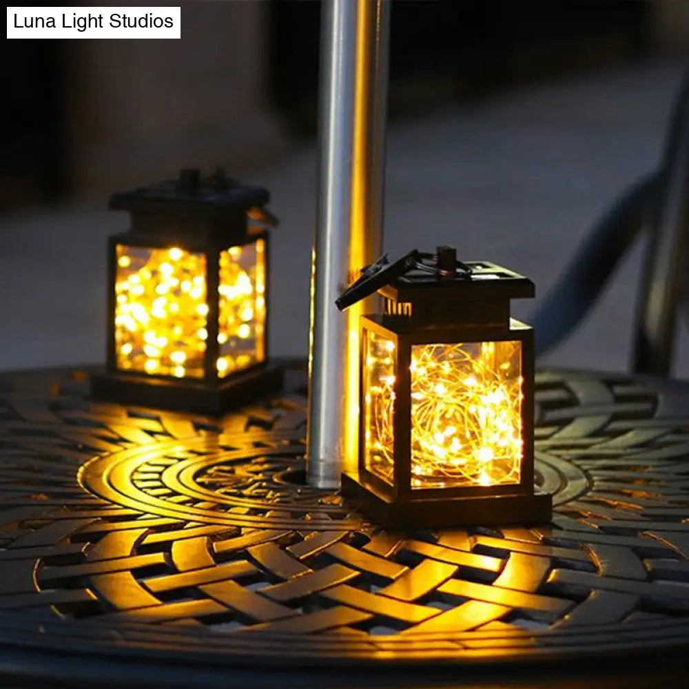 Artistic Black Led Solar Lantern Pendant Light With Clear Glass Clamp And Hook