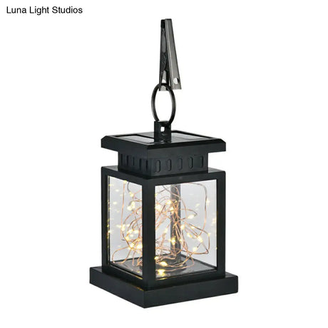 Artistic Black Led Solar Lantern Pendant Light With Clear Glass Clamp And Hook