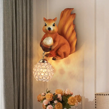 Beveled Clear Crystal Wall Sconce With Squirrel Decor In Gold/Brown Orange