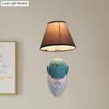 Bird Wall Mount Light Cartoon 1 Head Resin Sconce Lamp With Pink/Blue Color Cone Brown Fabric Shade